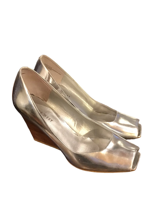 Women’s silver wedge shoes from Nine West